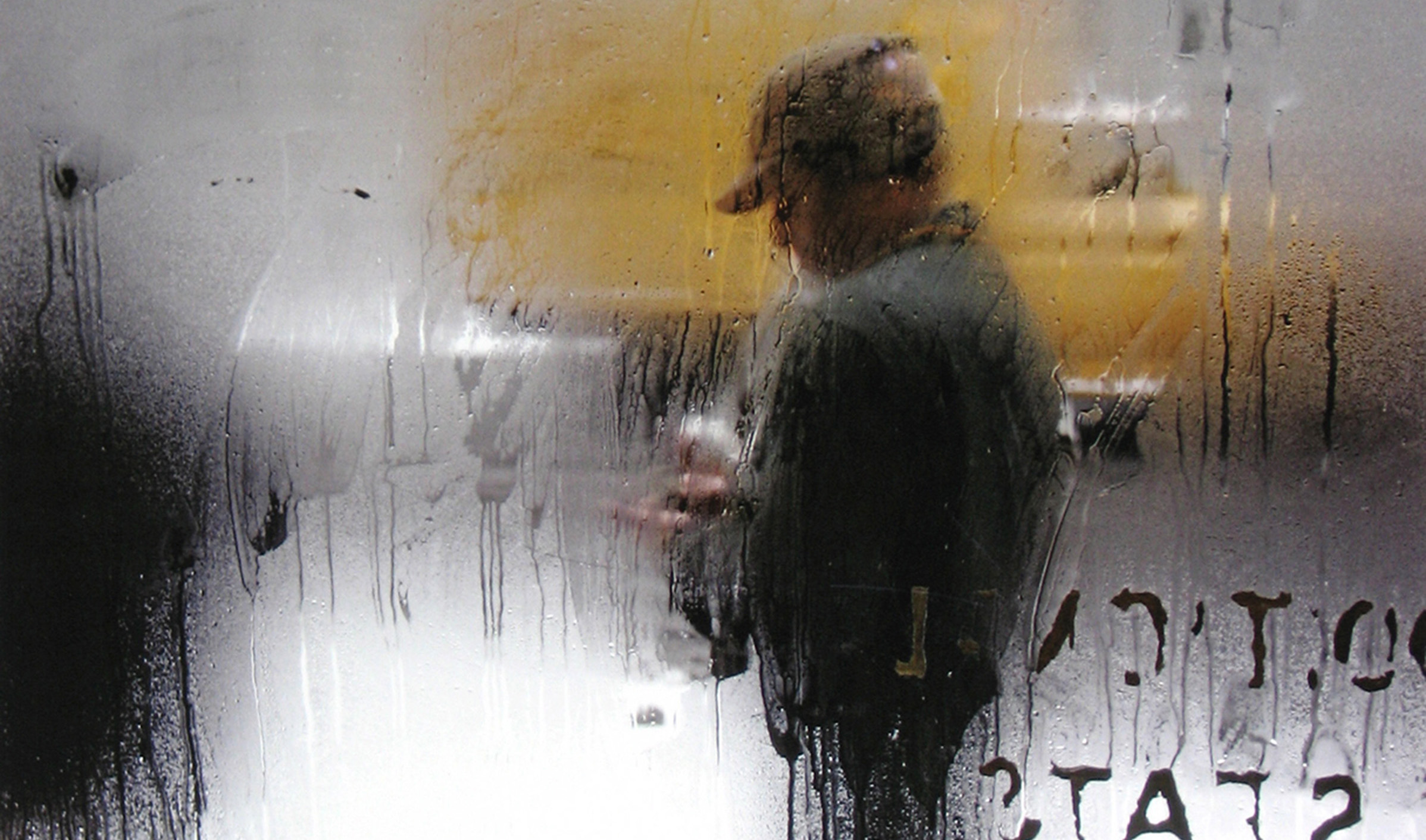 foto van Saul Leuter - Snow met wazige man